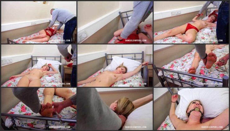 Stripped Lucy Cuffed and Ball-Gagged Chained to Bed
