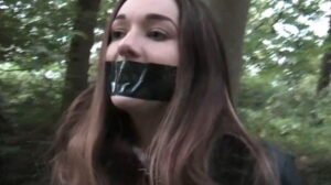 Samantha Wilson Handcuffed to a Tree and Gagged with Ducktape