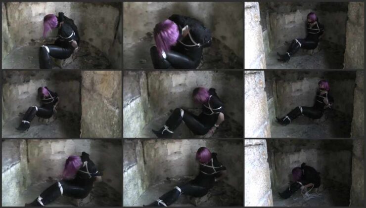Tracey in an old ruined building bound and gagged