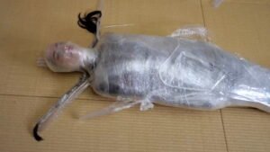 Fetish mummification for Hinako with Plastic Wrap creating a spider web style Part 4