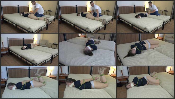 Rachel struggles with the ropes in her hotel room. Episode 3