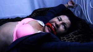 Full version video – Sahrye trapped, grunts and squirms handcuffed on a bed