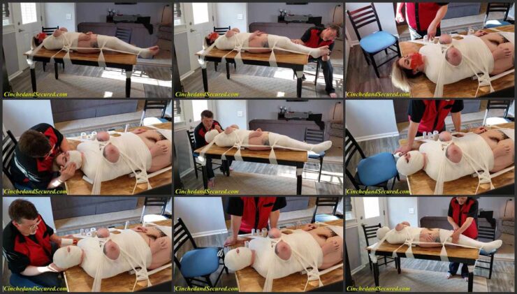 Ava Minx chained to bed and wrapped in bandages from head to toe