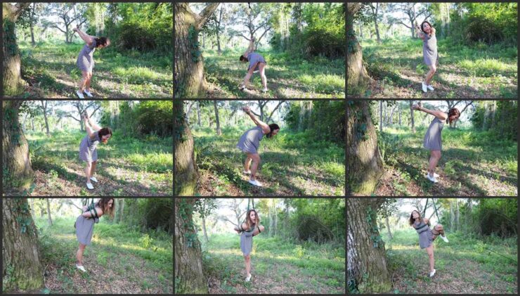 Clarice gagged and tied to a tree forced to struggles