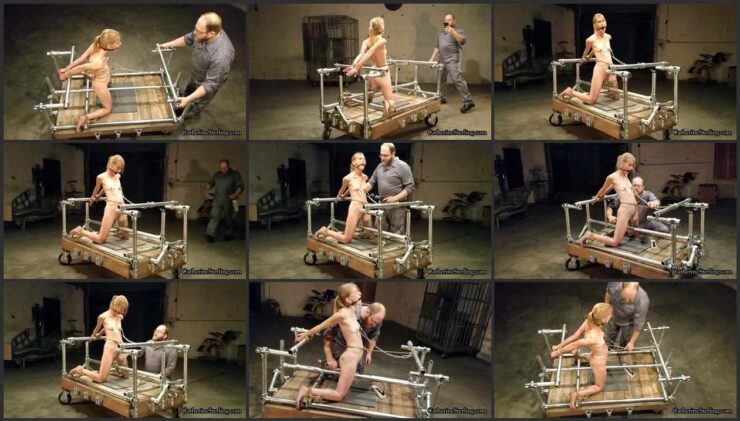 Sex slave girl strappado’d to steel device and spasms from the orgasms with wand vibrator