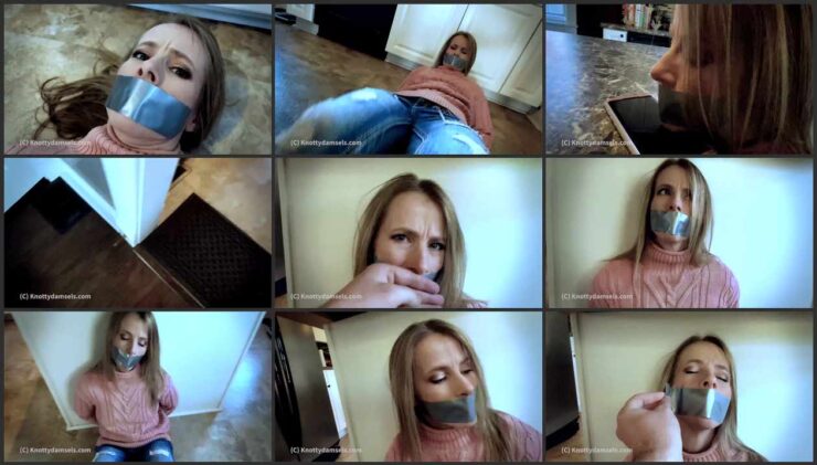 Claire tries to free herself from the rope and the gag