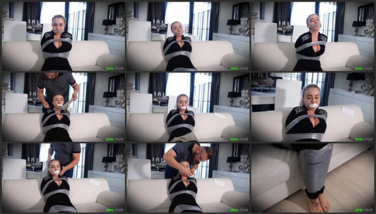 Aubrey in Jumpsuit tied struggling on the sofa 3 Gag Video