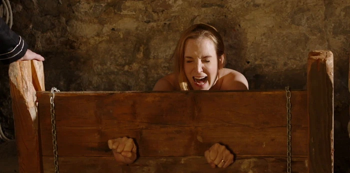 Bastinado with a riding crop in the stocks for Ariel and Lucy