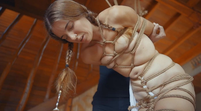 Milena to try bondage with a very large number of ropes