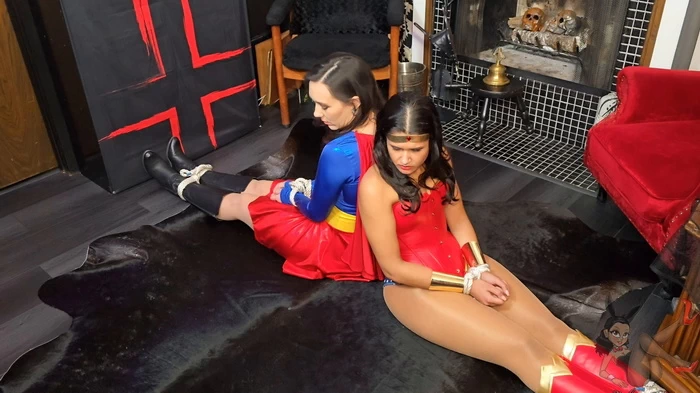 Super Girl and Wonder Woman Captured