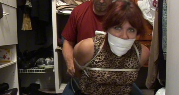Naughty MILF tied up in the closet