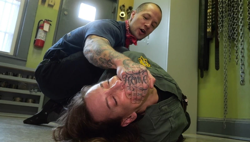 Changing of the Guard – Officer Graves is gagged and bound in a humiliating position