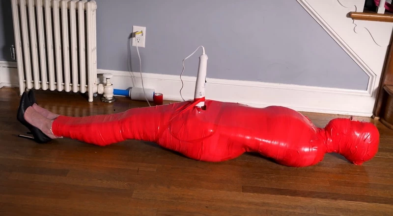 Crushed and Encased in Tight Red Tape with a Magic Wand