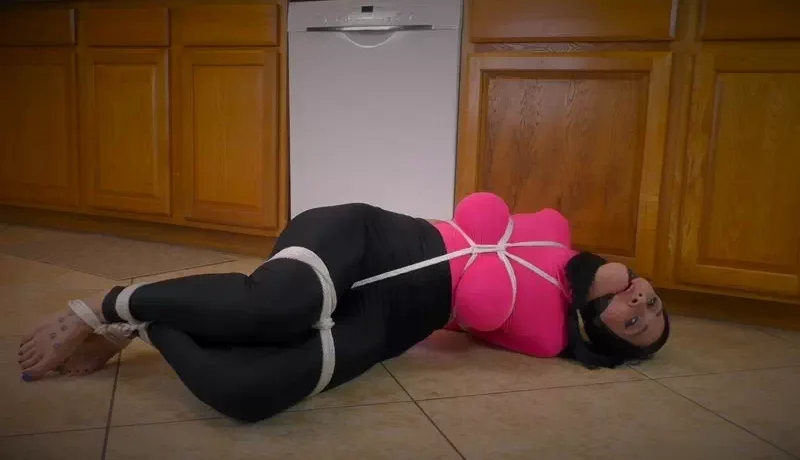 Cheater tied up struggles on the floor
