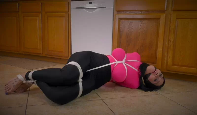 Cheater tied up struggles on the floor