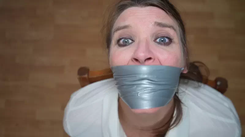 Claire chair tied, tightly tape gagged and toes tied torment Claire chair tied, tightly tape gagged and toes tied torment