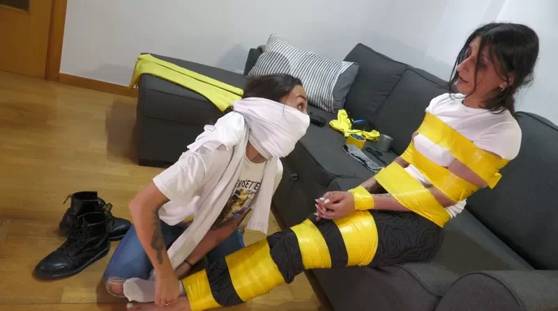 Gamer girls in PVC tape and gagged