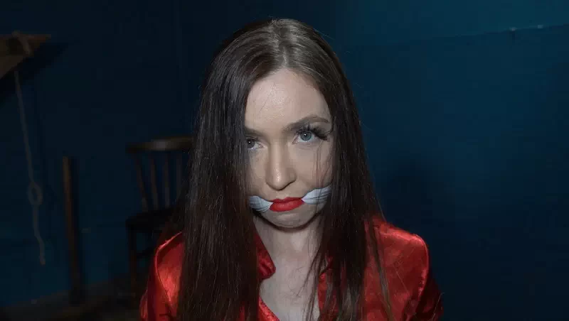 Jasmine struggles to get free in Gag for Teacher