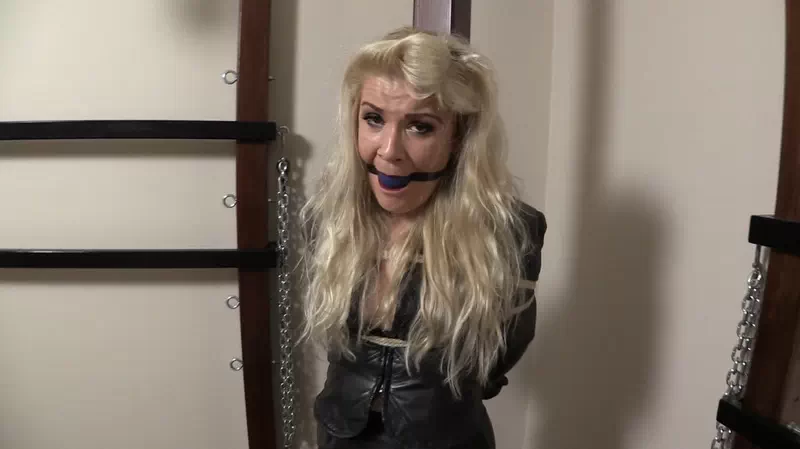 Leather Mistress Roped and Gagged