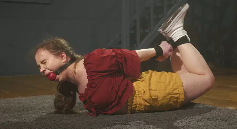 Struggling in a Brutally Tight Hogtie with Massive Ballgag