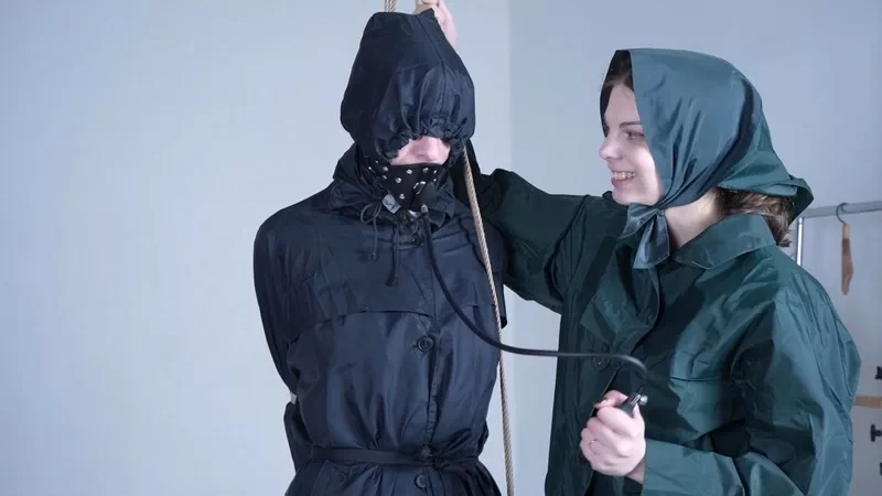 Raincoat slave is desparete for mistress’s kiss
