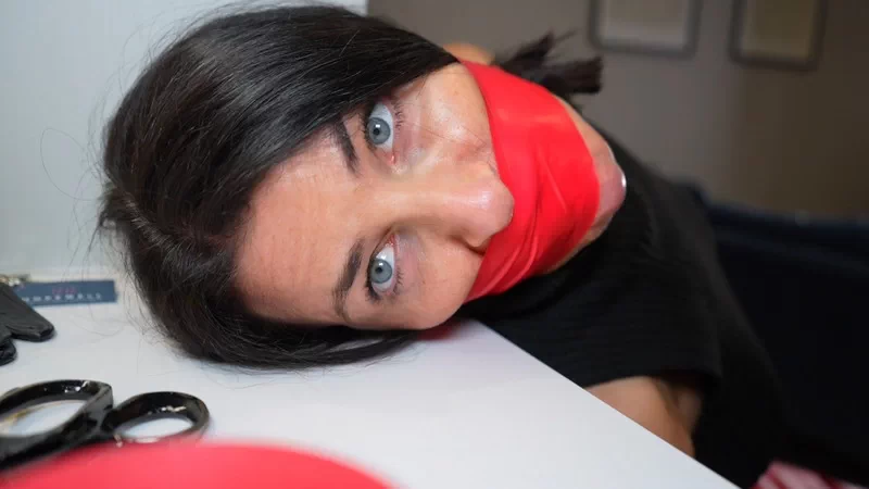 Agent red captured, chair tied and multi gagged