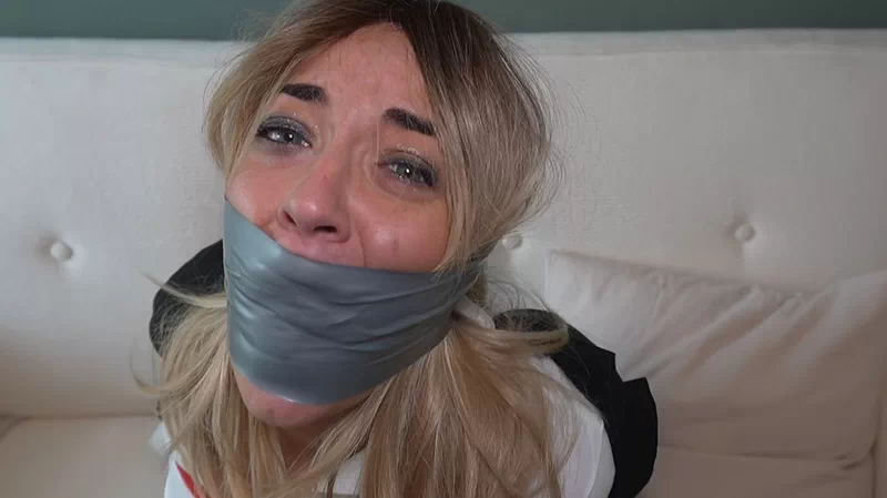 A Blonde Businesswoman Tied Up And Gagged