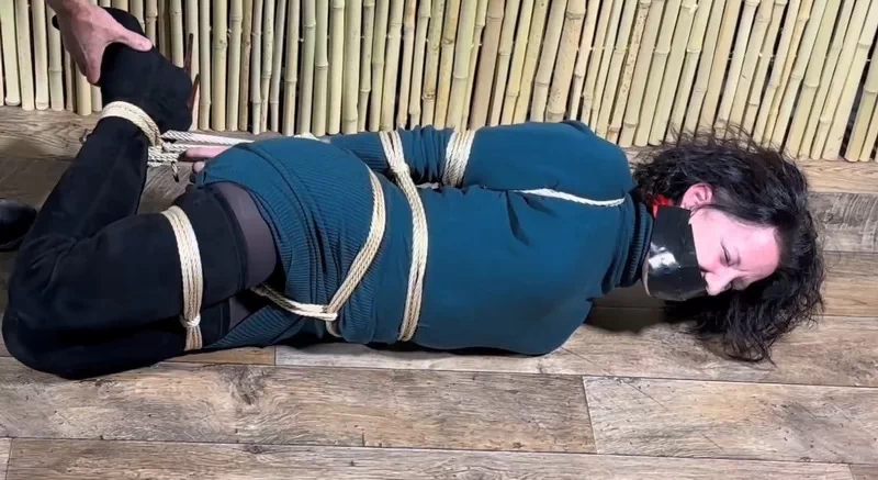 Simona get hogtied onscreen with her thigh high boots!