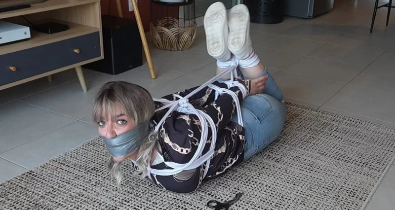 A Housewife Bound And Gagged